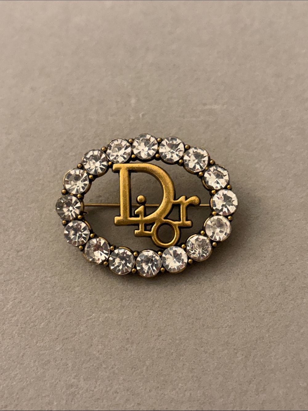 Gold Logo Brooch with Clear Crystal Halo